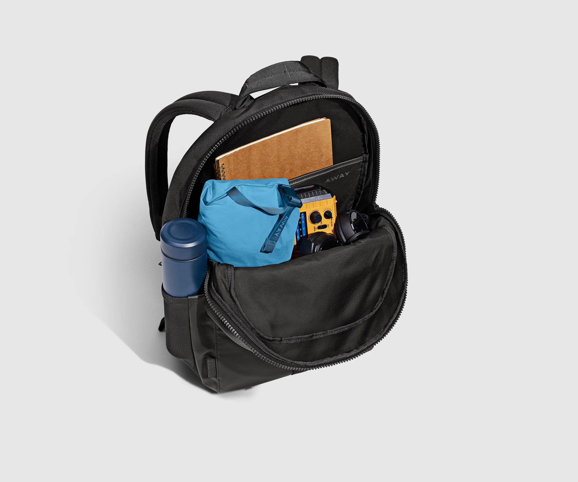 Video of a person packing and wearing the Active Backpack 26L